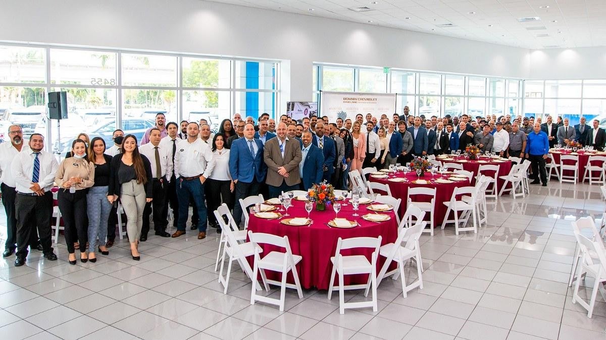 Large group photo at a dinner event